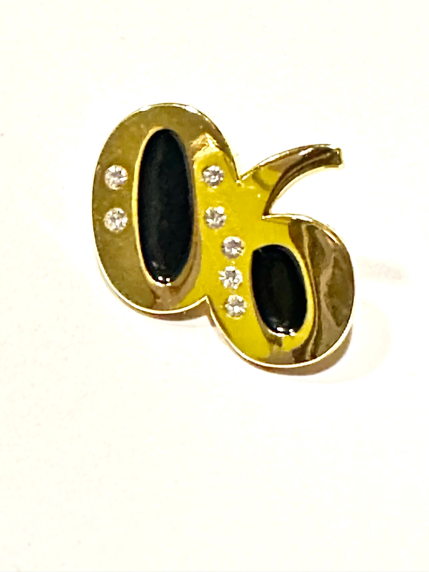 Alpha Phi Alpha '06' lapel pin with seven stones throughout